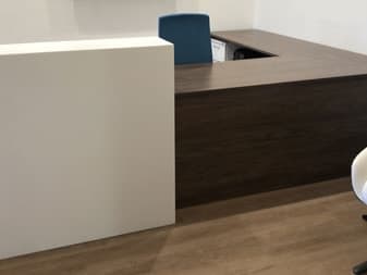 Reception desk in white and wood-grain solid surface